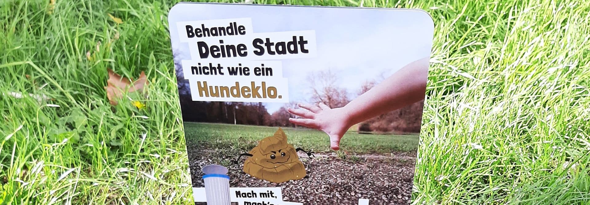 Schild mit der Aufschrift Behandle deine Stadt nicht wie ein Hundeklo